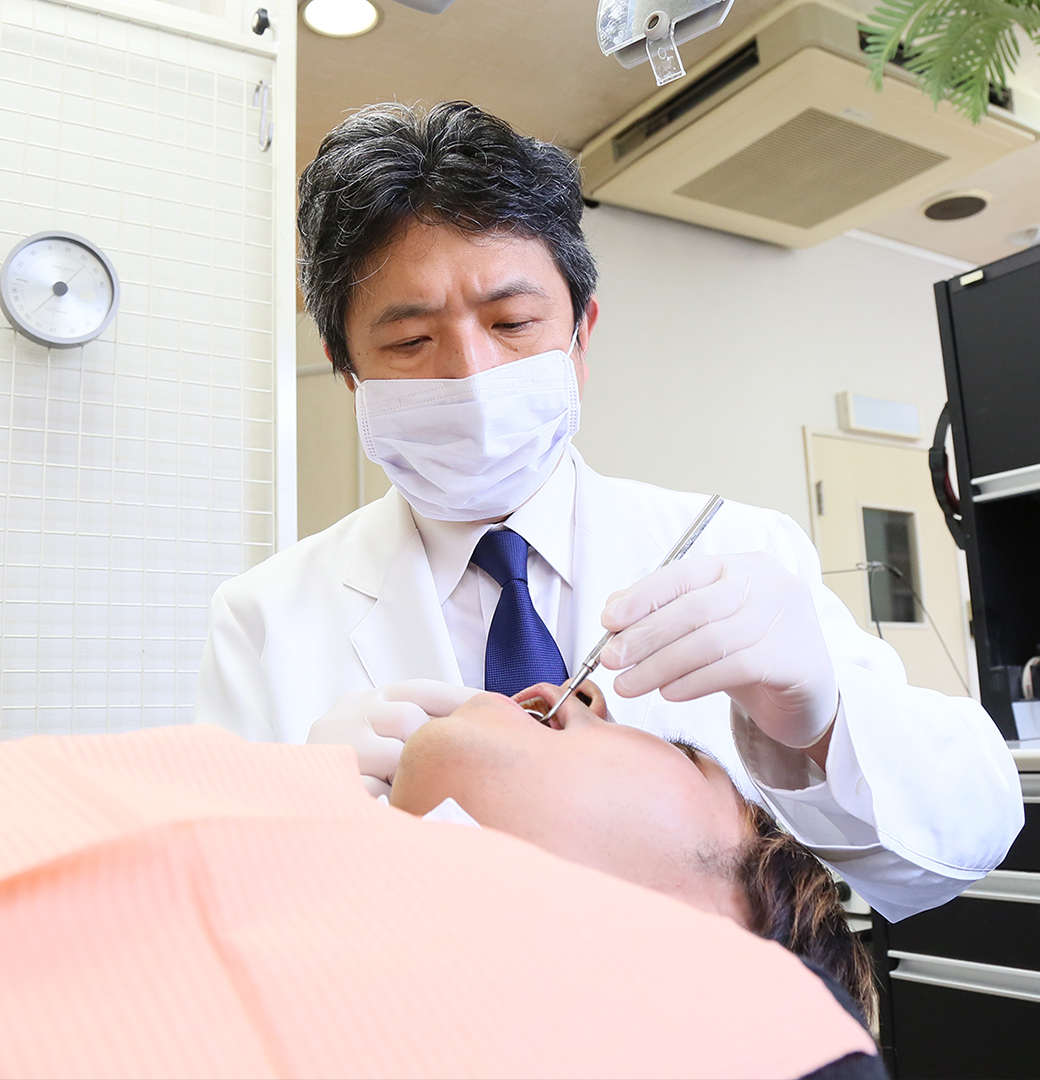 Dr. 遅澤 顕二(院長)